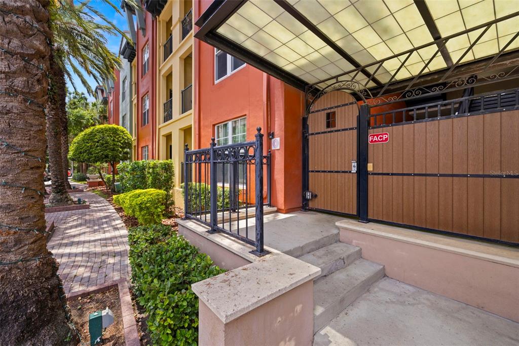 2410 West Azeele Street, Unit 214 Tampa, FL 33609 - Photo 22 of 24 a view of a pathway with a backyard