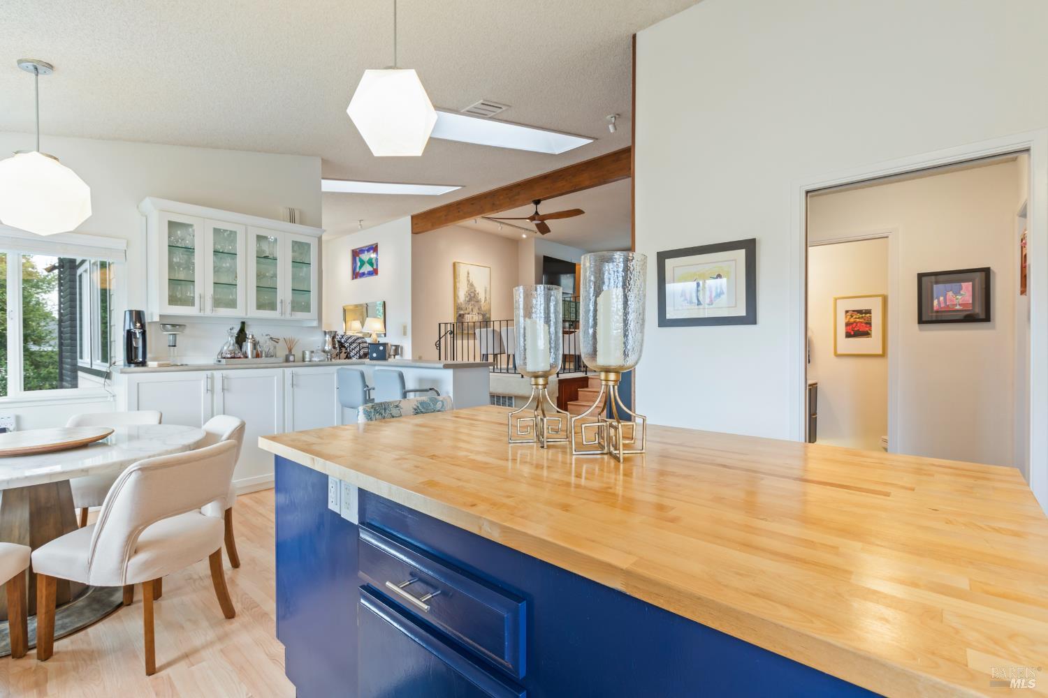 410 Oak Mesa Court Santa Rosa, CA 95409 - Photo 15 of 41 a view of kitchen island a chandelier and living room view