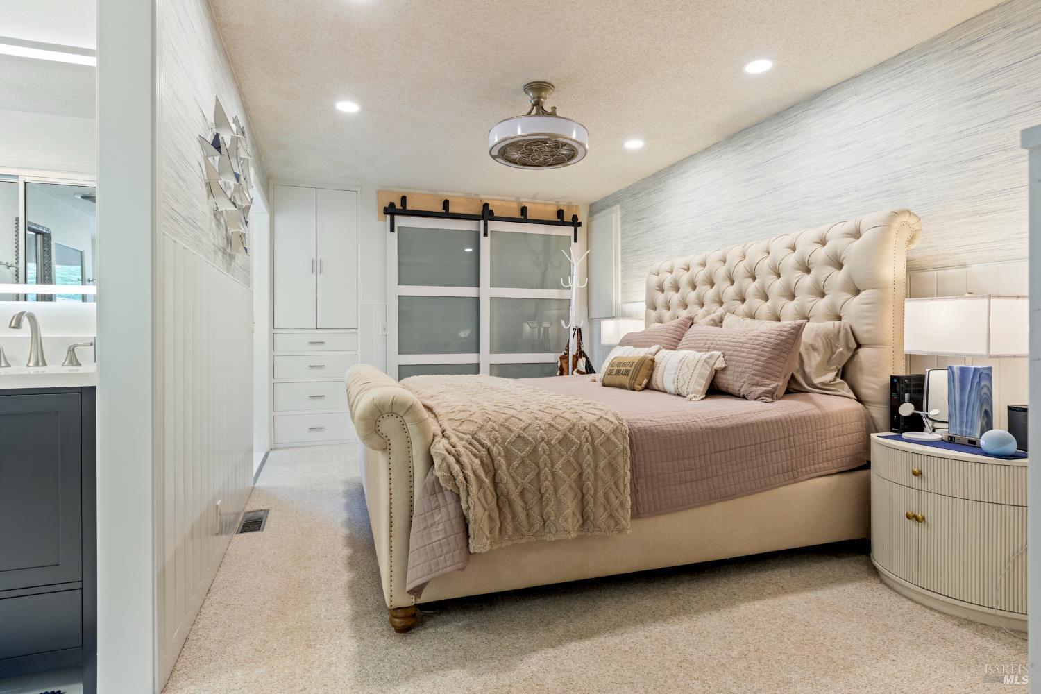 410 Oak Mesa Court Santa Rosa, CA 95409 - Photo 18 of 41 a bedroom with a bed and a window