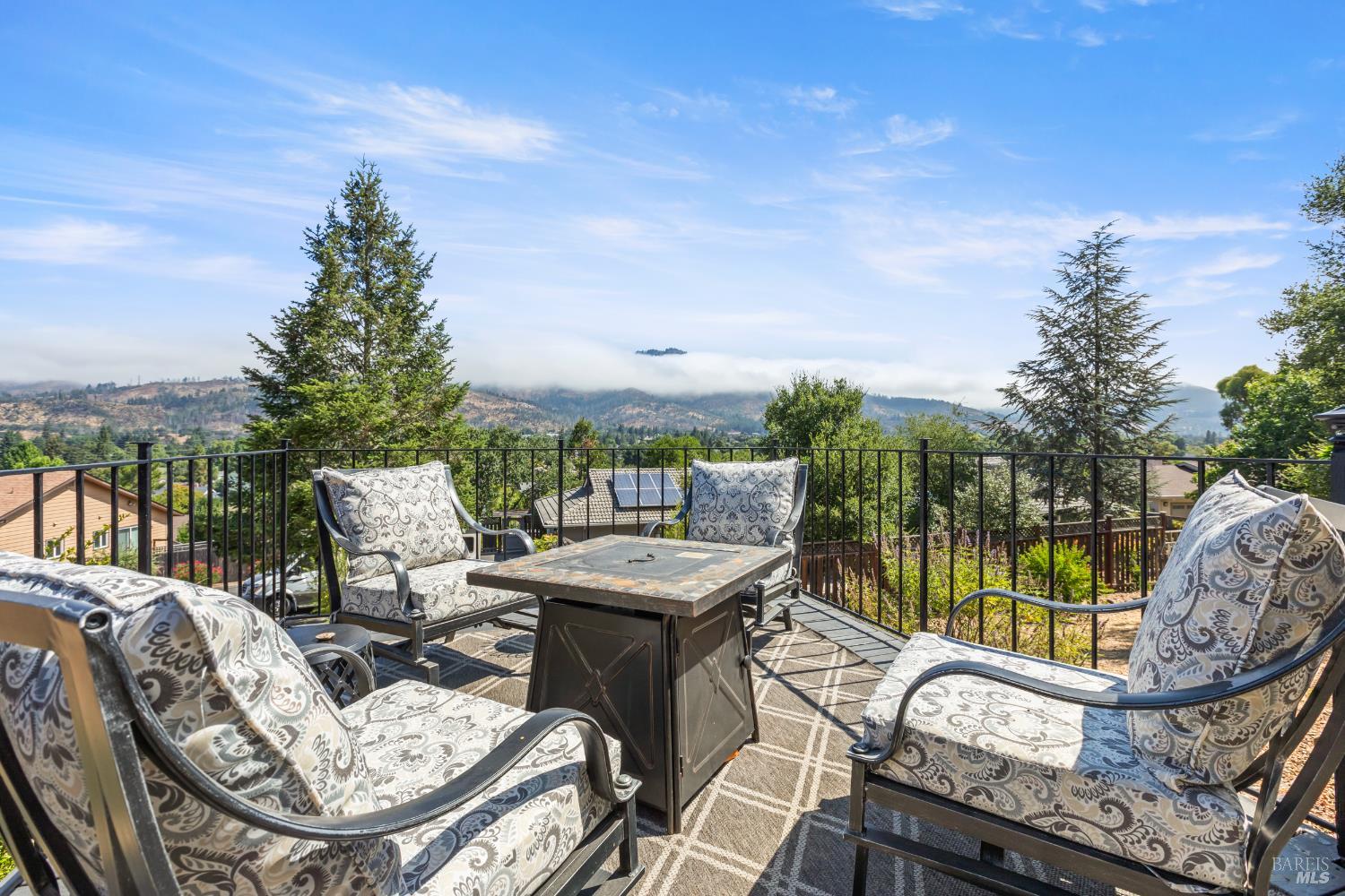 410 Oak Mesa Court Santa Rosa, CA 95409 - Photo 2 of 41 a terrace of a house with outdoor seating