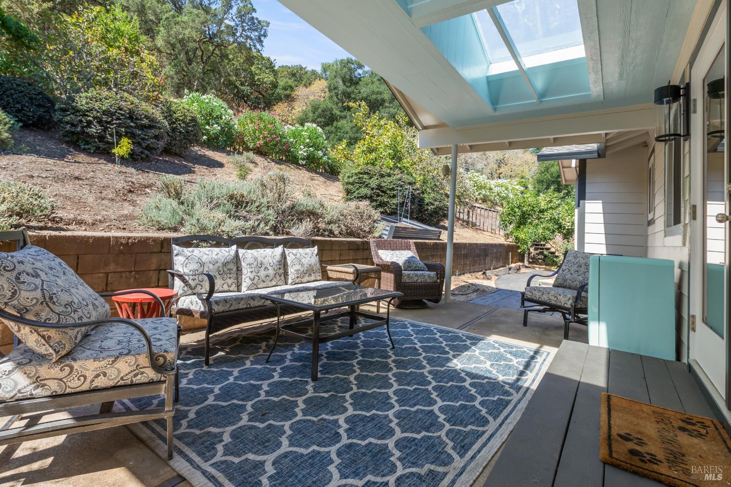 410 Oak Mesa Court Santa Rosa, CA 95409 - Photo 34 of 41 a outdoor space with patio couch and a fireplace