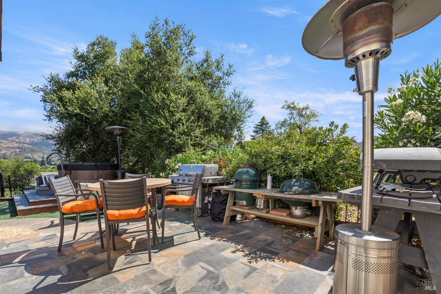 410 Oak Mesa Court Santa Rosa, CA 95409 - Photo 35 of 41 an outdoor sitting area with a table and chairs