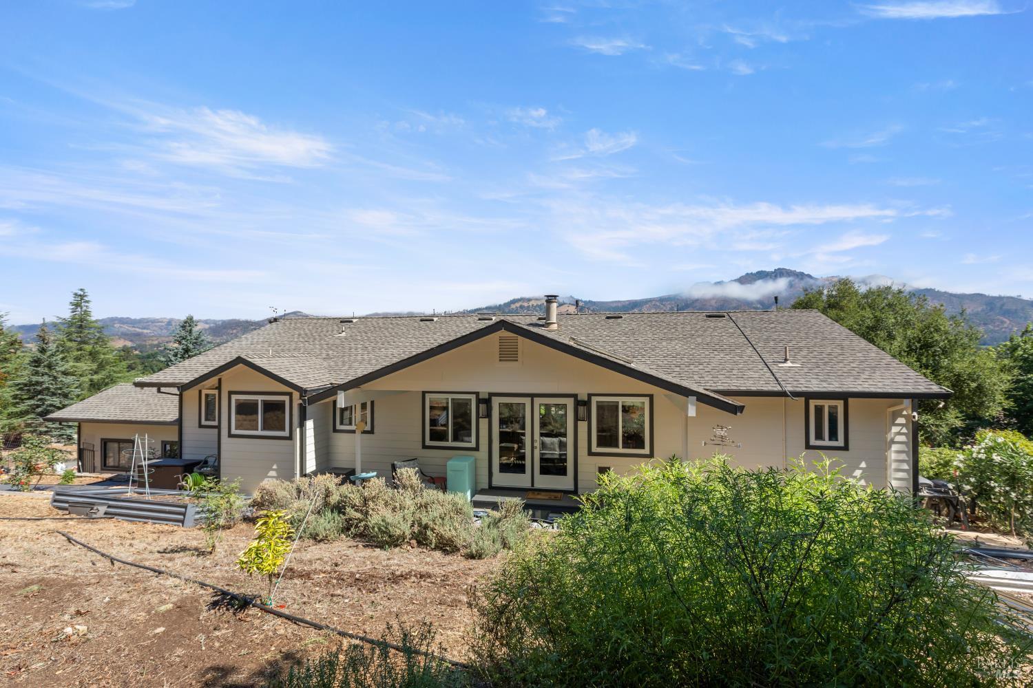 410 Oak Mesa Court Santa Rosa, CA 95409 - Photo 36 of 41 a front view of a house with a yard