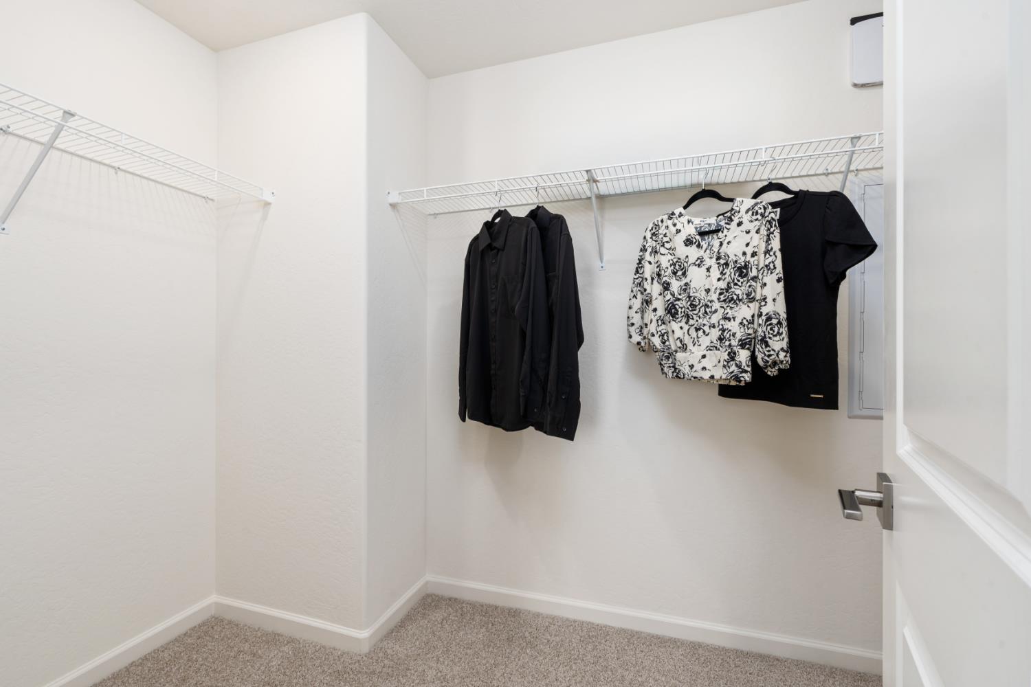 1465 Farmhouse Lane Clovis, CA 93619 - Photo 27 of 33 a view of walk in closet with clothes