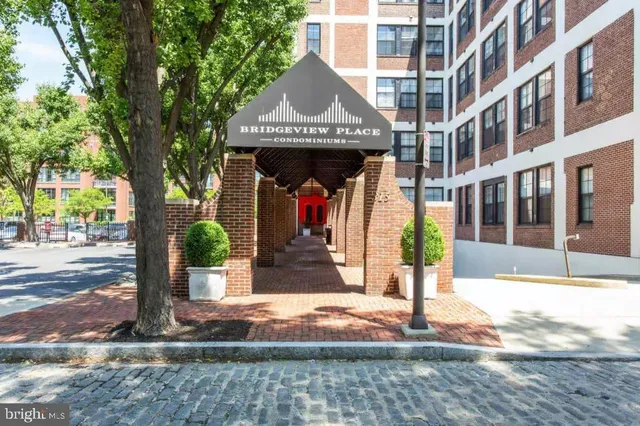 a front view of a building with street view