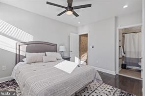 230 North Luzerne Avenue Baltimore, MD 21224 - Photo 12 of 18 Modern bedroom with natural light and style.