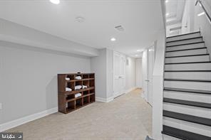 230 North Luzerne Avenue Baltimore, MD 21224 - Photo 13 of 18 Bright and spacious basement retreat.