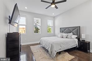 230 North Luzerne Avenue Baltimore, MD 21224 - Photo 6 of 18 Modern bedroom with natural light and style.