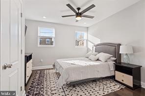 230 North Luzerne Avenue Baltimore, MD 21224 - Photo 8 of 18 Bright and airy modern bedroom retreat.