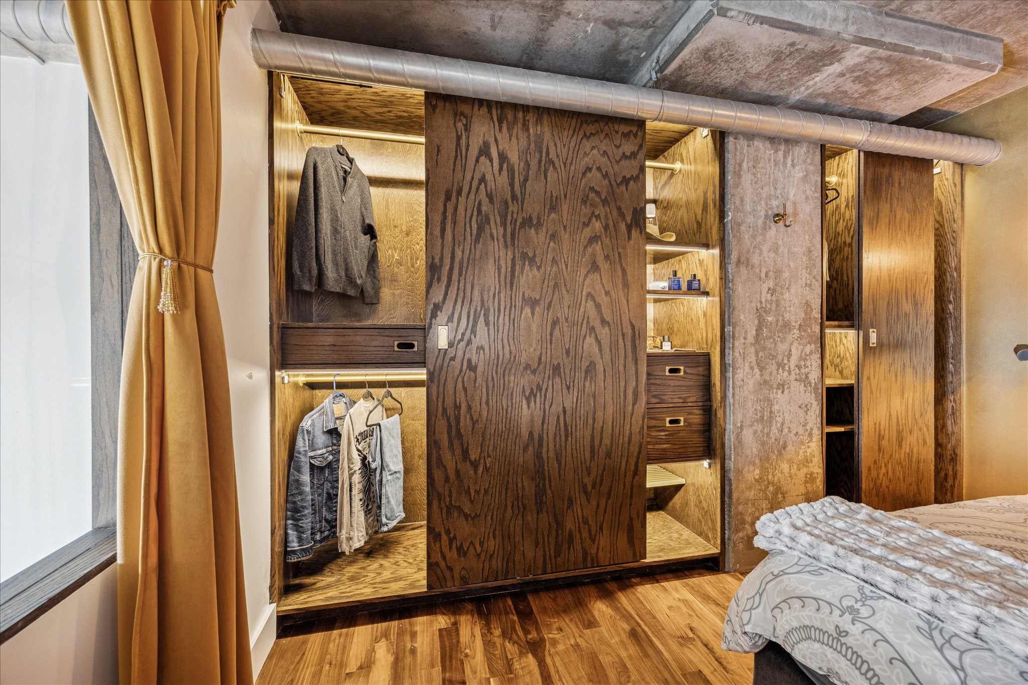 2000 Bagby Street, Unit 5400 Houston, TX 77002 - Photo 22 of 47 His and Hers custom built-in armoire with LED lighting and soft-close