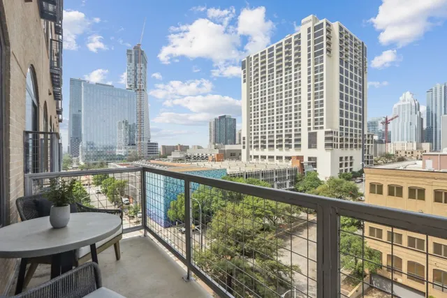 a bathroom with a shower sink and mirror