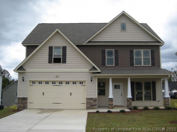 182 Culpepper Road Cameron, NC 28326 - Photo 1 of 13 a front view of a house with a yard