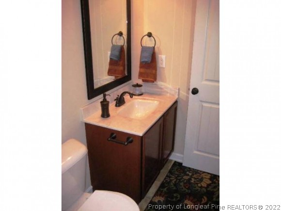 182 Culpepper Road Cameron, NC 28326 - Photo 11 of 13 a bathroom with a sink and a mirror