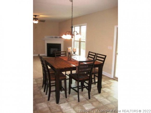 182 Culpepper Road Cameron, NC 28326 - Photo 13 of 13 a dining room with furniture and window