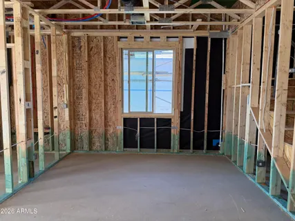 a view of a room with wooden walls