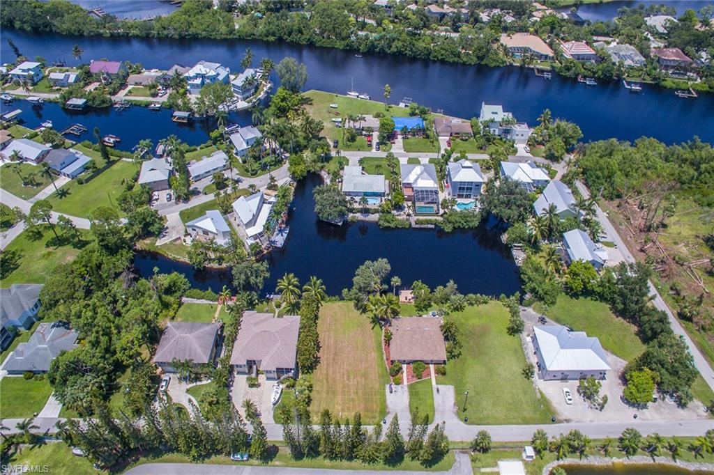 3665 Riviera Circle Bonita Springs, FL 34134 - Photo 16 of 24 an aerial view of a houses and outdoor space