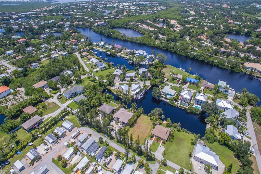 3665 Riviera Circle Bonita Springs, FL 34134 - Photo 17 of 24 an aerial view of a city