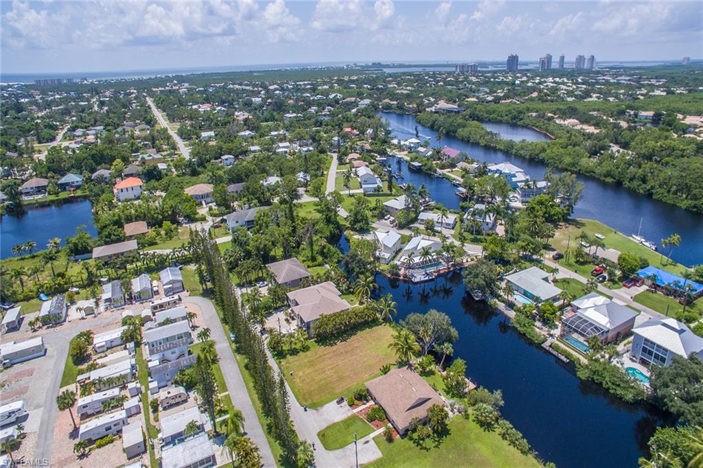 3665 Riviera Circle Bonita Springs, FL 34134 - Photo 22 of 24 an aerial view of residential houses with outdoor space