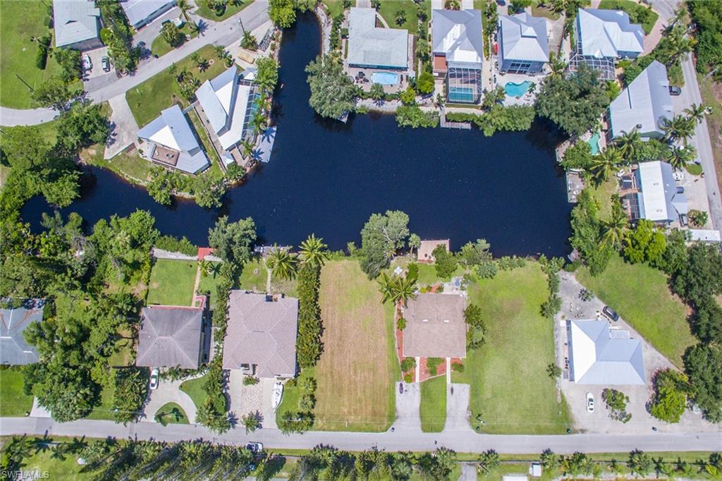 3665 Riviera Circle Bonita Springs, FL 34134 - Photo 24 of 24 an aerial view of a house