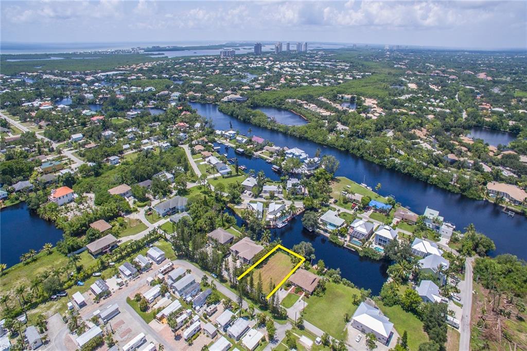 3665 Riviera Circle Bonita Springs, FL 34134 - Photo 3 of 24 an aerial view of a city