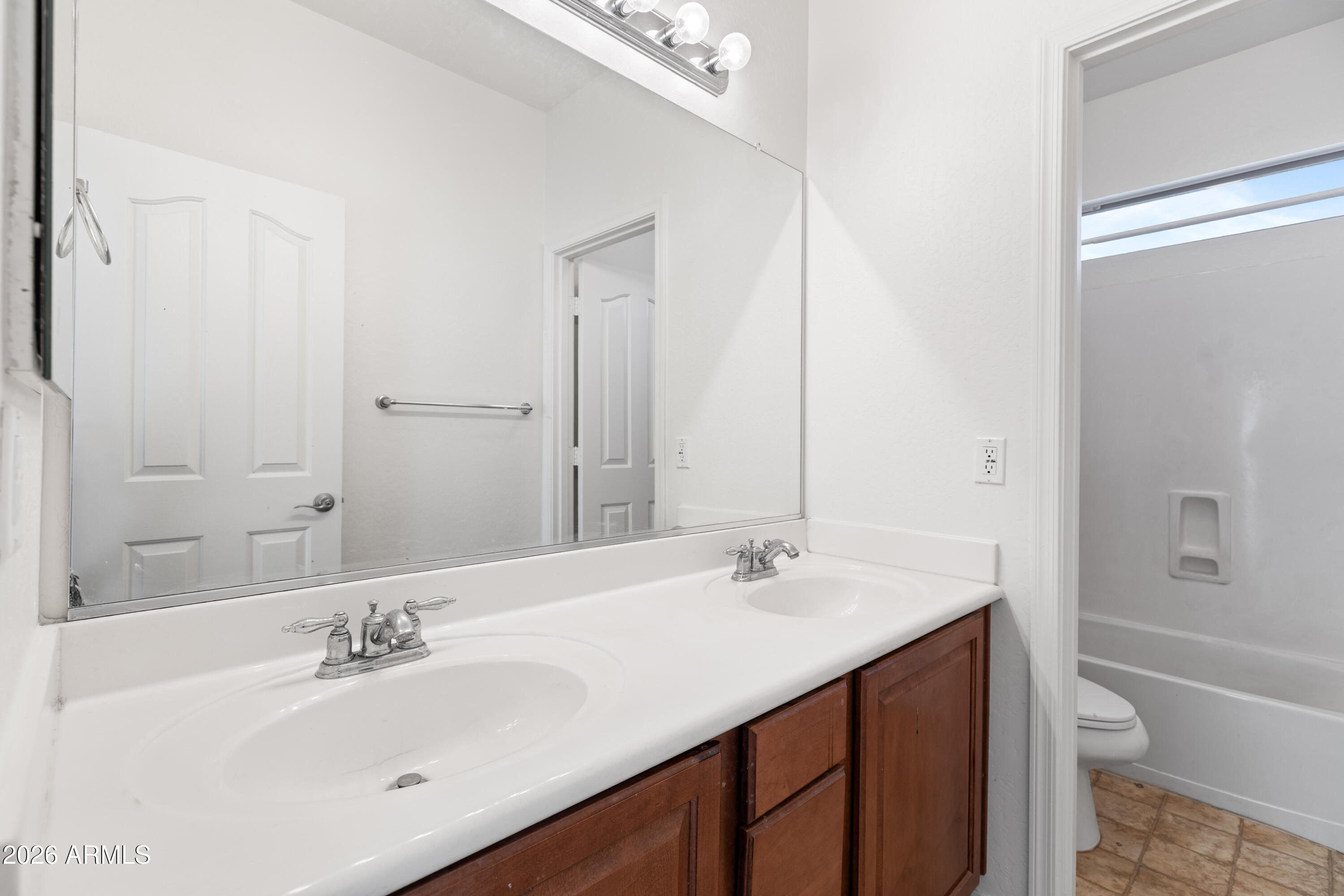 9840 Tangerine Road Florence, AZ 85132 - Photo 26 of 38 a bathroom with a sink double vanity granite toilet tub and shower