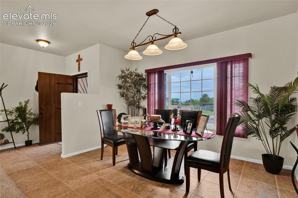 12266 Crystal Downs Road Peyton, CO 80831 - Photo 10 of 50 Formal dining area