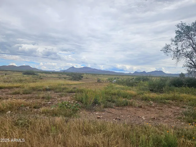 a view of lake with mountain