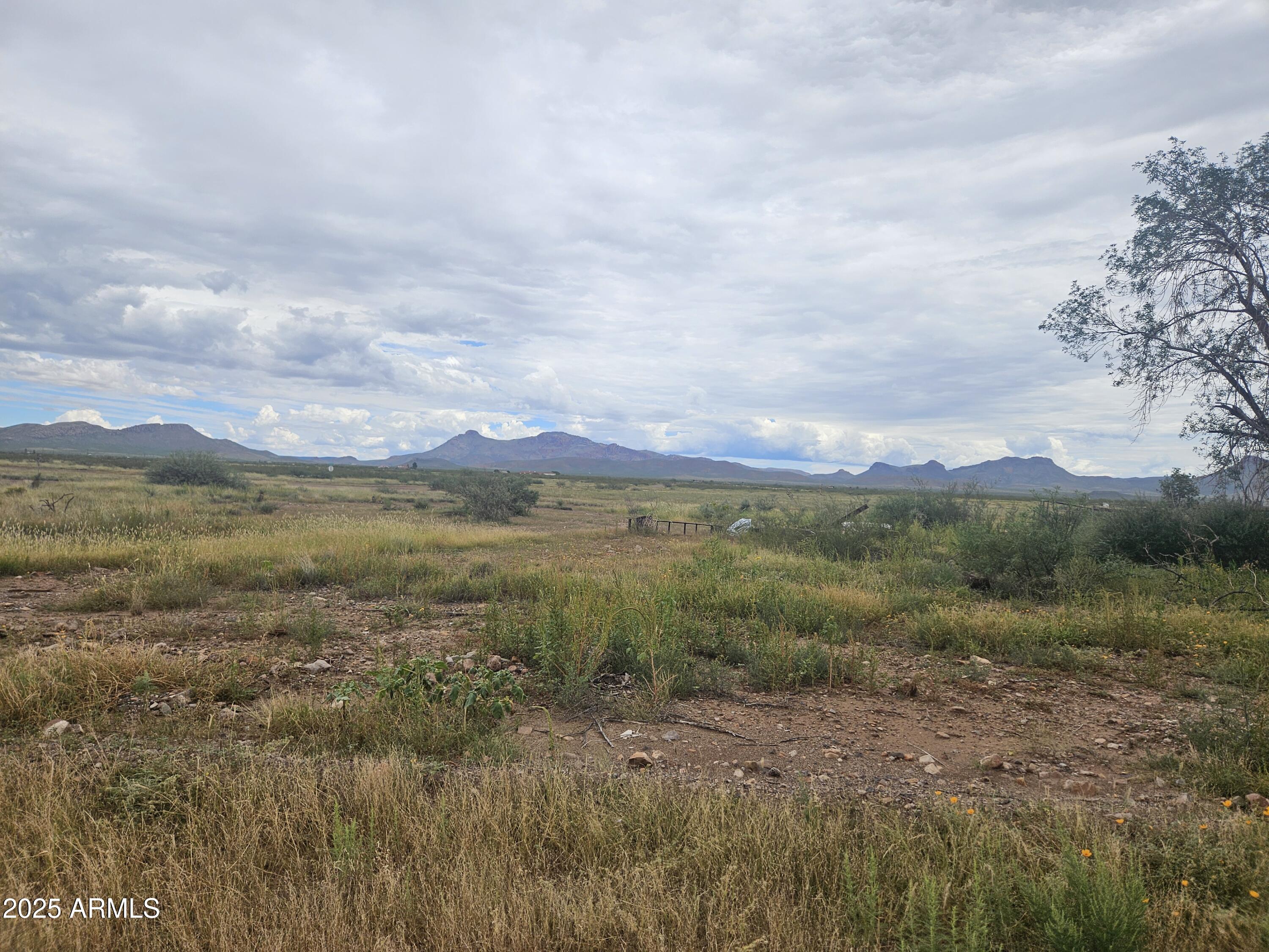 a view of lake with mountain
