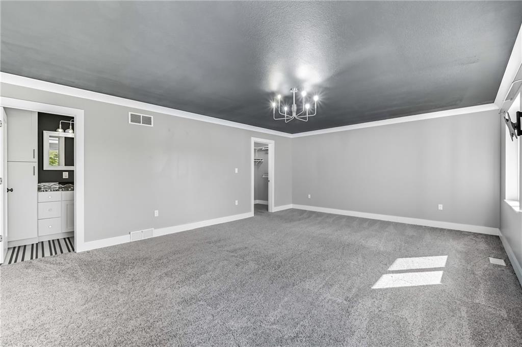 5237 Virginia Road Hermitage, PA 16148 - Photo 17 of 49 a view of empty room with chandelier