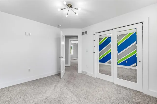 a view of an entryway with a workspace