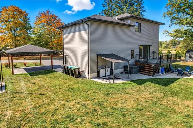 a view of a backyard with a patio
