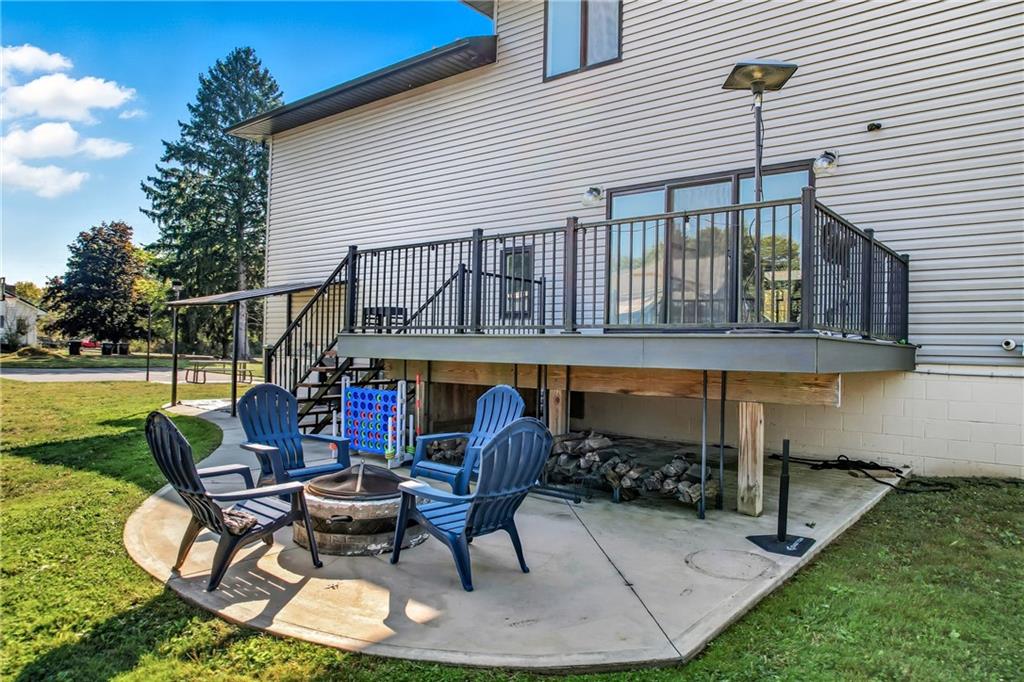 5237 Virginia Road Hermitage, PA 16148 - Photo 42 of 49 a patio with table and chairs and potted plants