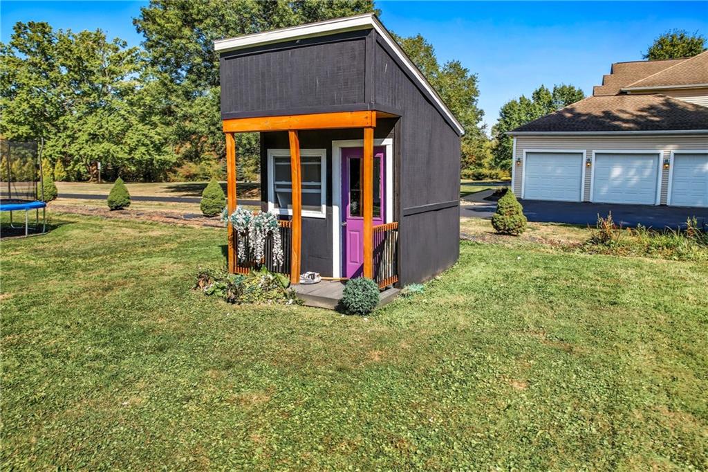 5237 Virginia Road Hermitage, PA 16148 - Photo 46 of 49 a view of a house with a yard and sitting area