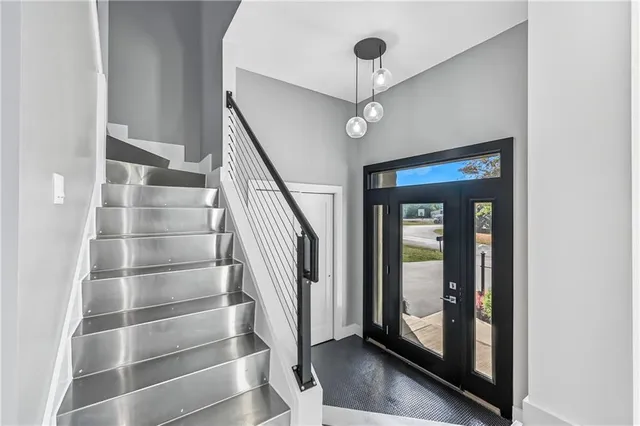 a view of entryway with stairs