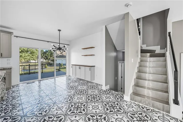 a view of entryway with stairs