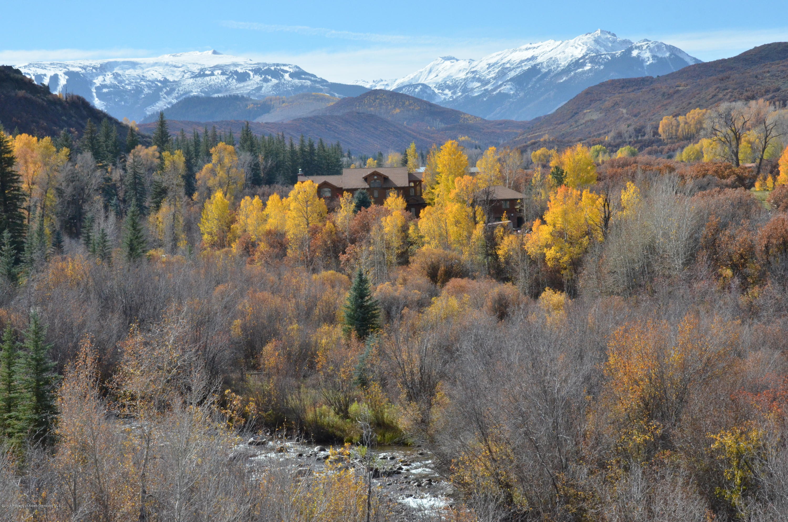3768 Snowmass Creek Road Snowmass, CO 81654 - Photo 4 of 28 a view of a houses with a yard