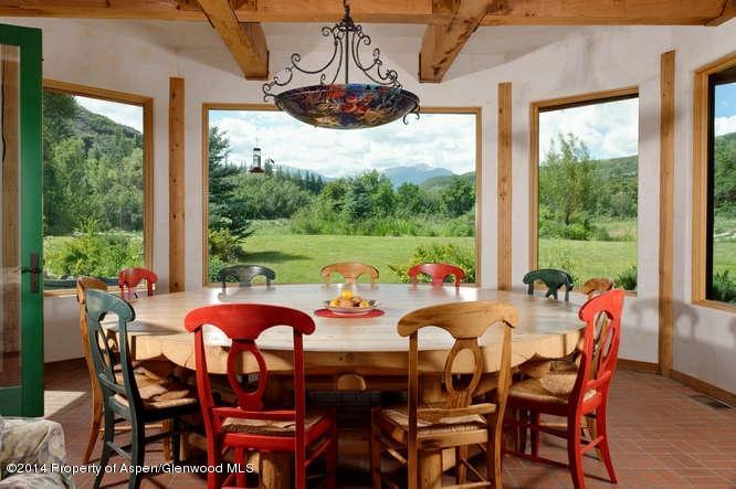 3768 Snowmass Creek Road Snowmass, CO 81654 - Photo 6 of 28 a outdoor dining space with furniture and outdoor view