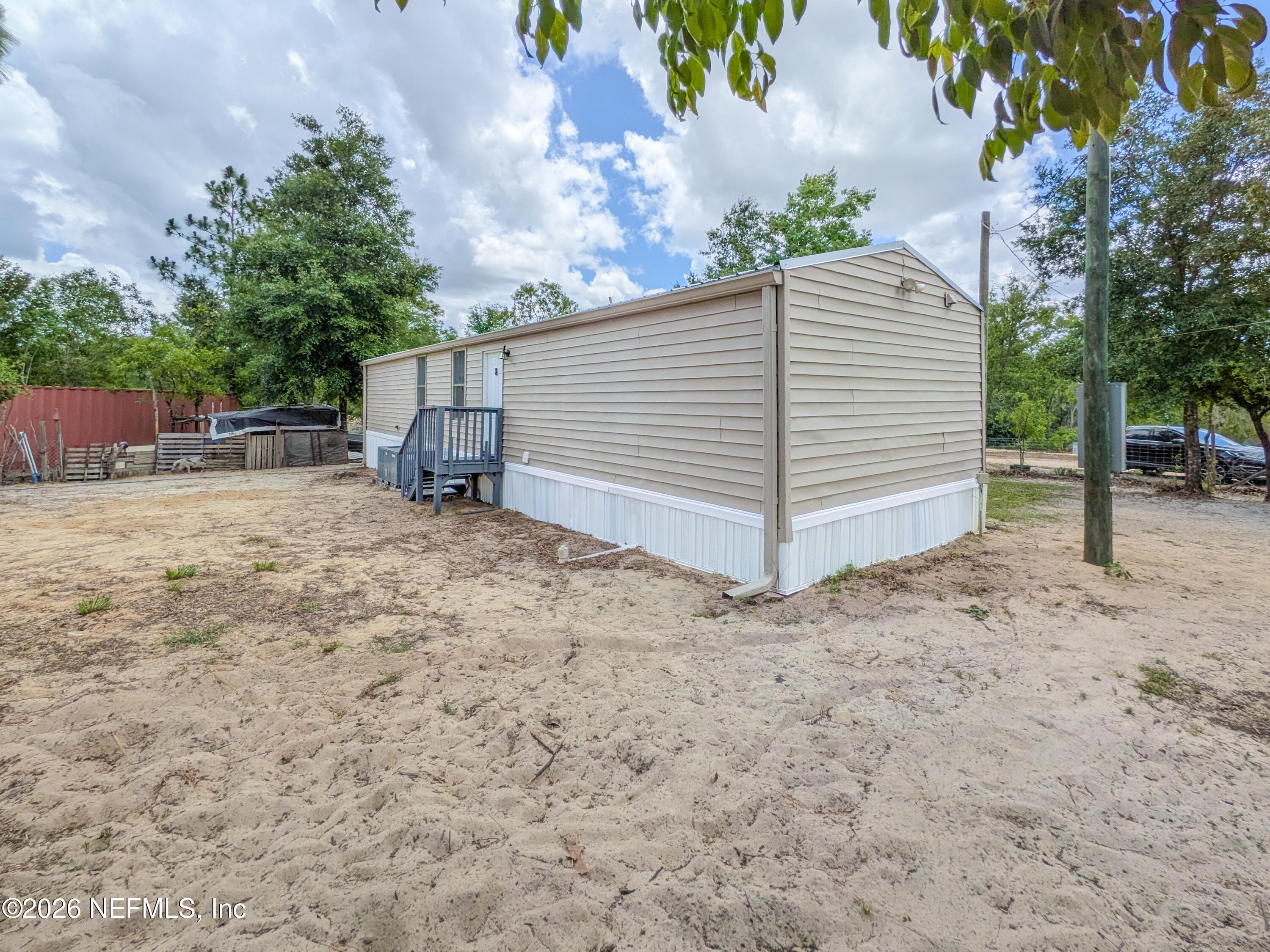 116 London Avenue Interlachen, FL 32148 - Photo 23 of 25 a view of a house with a yard