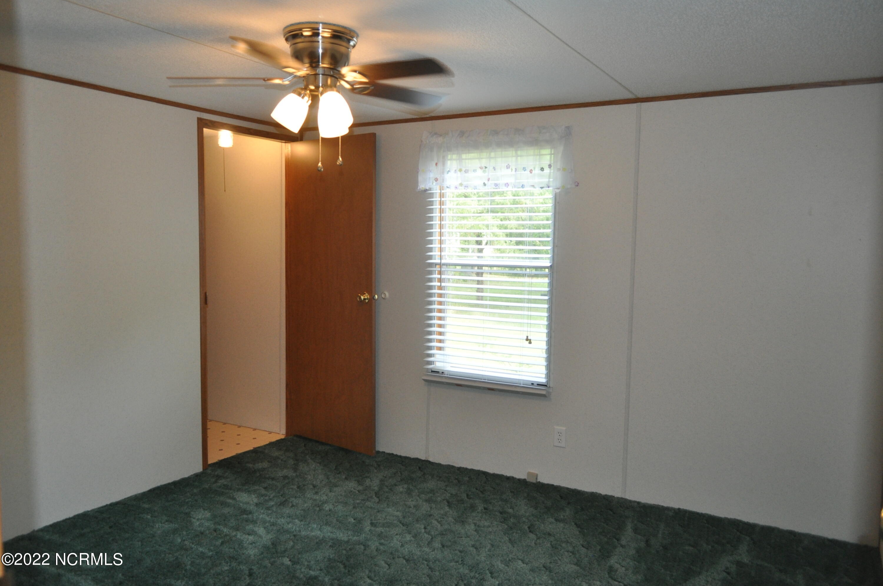 119 Juniper Trail Hampstead, NC 28443 - Photo 26 of 30 Bedroom 2 with large closet