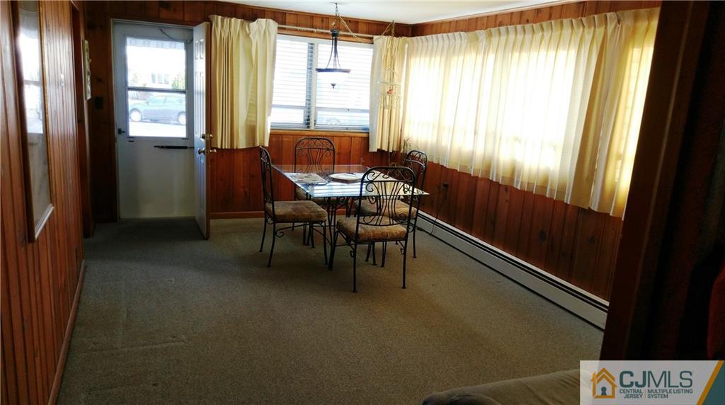 41 Winthrop Road Edison, NJ 08817 - Photo 17 of 18 a dining room with furniture and a window
