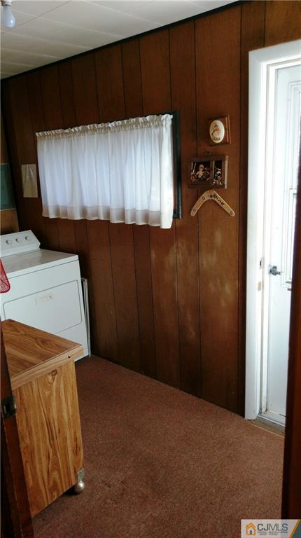 41 Winthrop Road Edison, NJ 08817 - Photo 18 of 18 a view of storage and utility room with a refrigerator