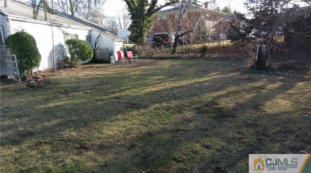 41 Winthrop Road Edison, NJ 08817 - Photo 5 of 18 a view of outdoor space with tree s