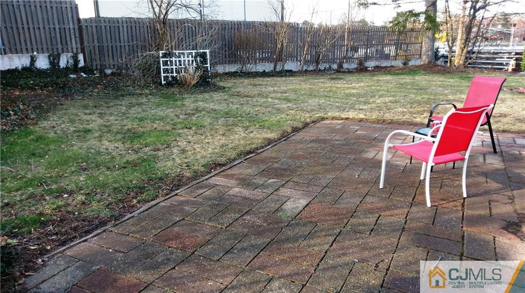 41 Winthrop Road Edison, NJ 08817 - Photo 6 of 18 a view of a backyard with table and chairs