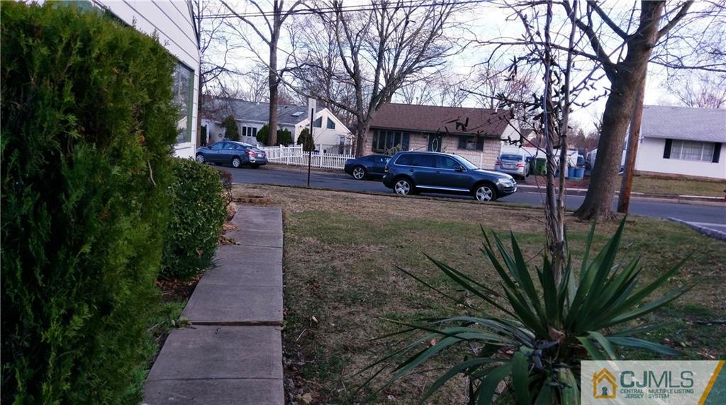 41 Winthrop Road Edison, NJ 08817 - Photo 7 of 18 a view of a street with houses on both side