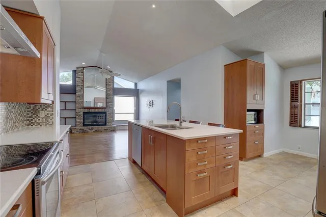 a kitchen with a stove and a sink