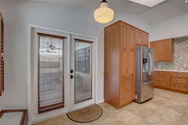 a bathroom with a shower and a sink
