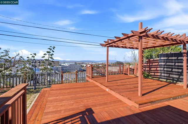 a view of a balcony with city view