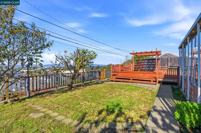 a view of a backyard with plants