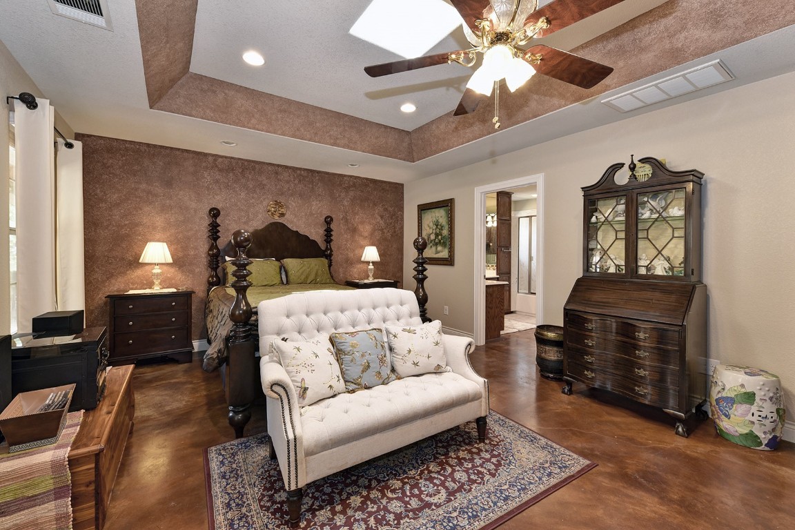 4525 Bell Springs Road Dripping Springs, TX 78620 - Photo 11 of 38 a living room with furniture and a chandelier