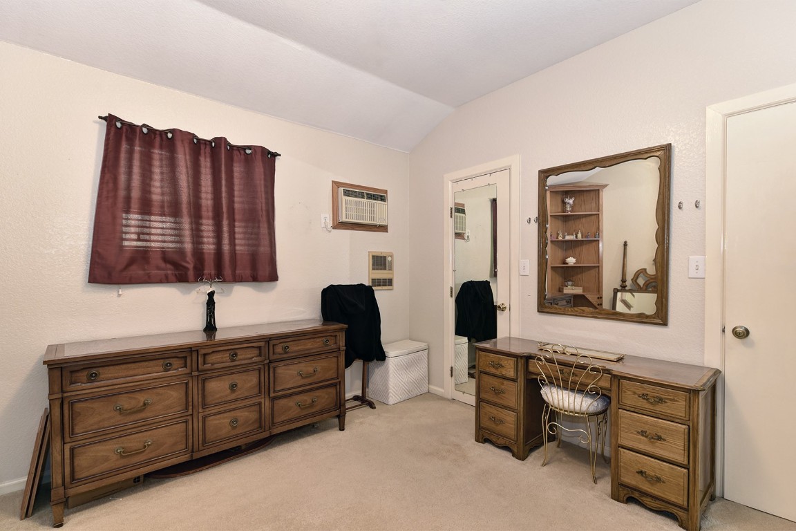 4525 Bell Springs Road Dripping Springs, TX 78620 - Photo 20 of 38 a living room with furniture and dresser